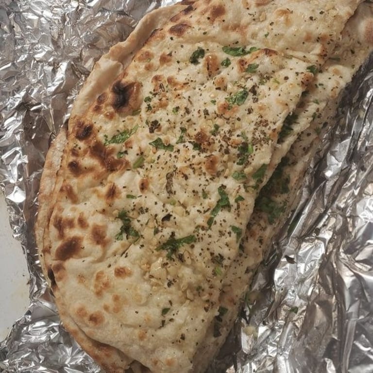 Savor our authentic naan